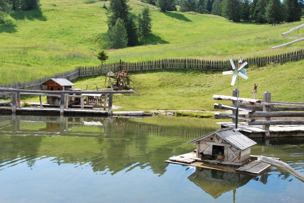 Family hiking Dolomites Italy alpine playgrounds