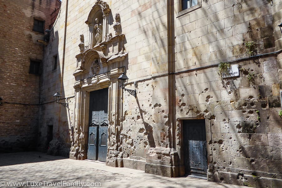 The exterior wall of the church Sant Philip Neri showing damage from a bomb blast in 1938