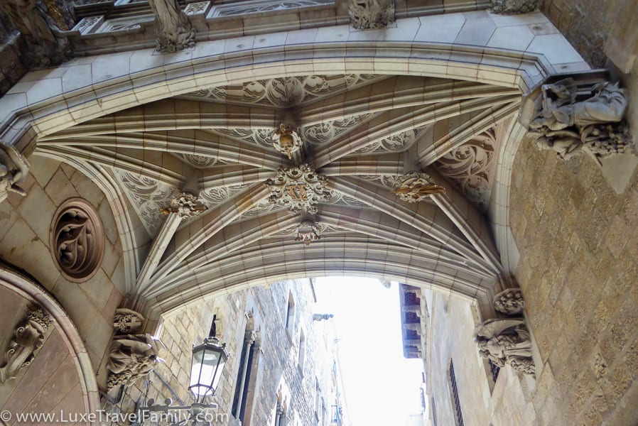 Gargoyles and decorative carving under the Bridge of Sighs, Barcelona