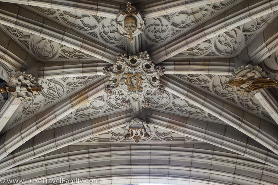 A skull and other designs under the arch at the Bridge of Sighs, Barcelona