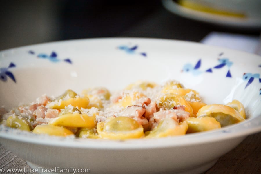 Tortellini, ham and parmesan cheese in a bowl at Four Seasons Milano