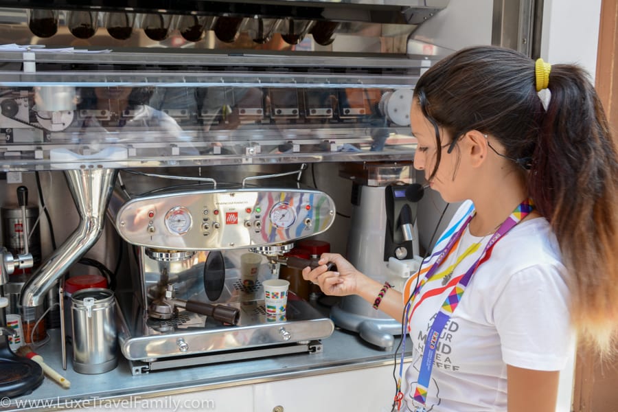 A barista making an illy espresso at Expo 2015 Milan