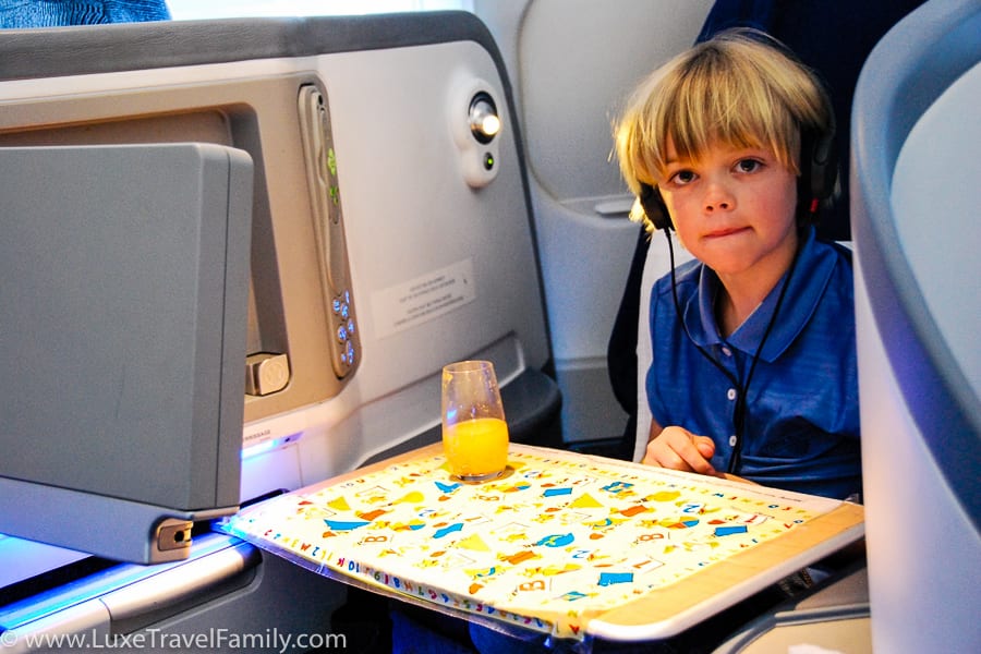 Tips for flying with kids use a tray cover