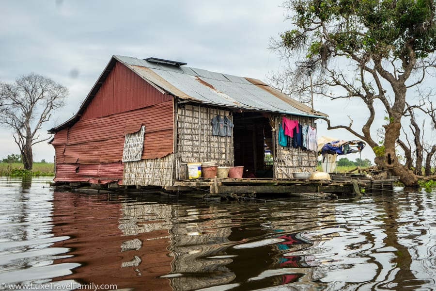 Float home kayaking on Tonle Sap Lake with Smiling Albino