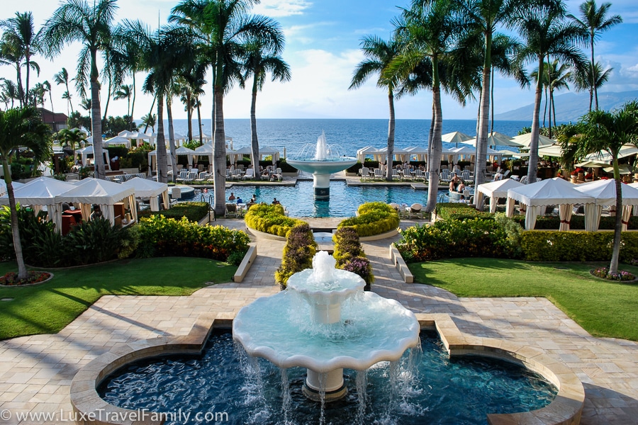 Four Seasons Maui at Wailea decorate water feature with fountain and large swimming pool with fountain.